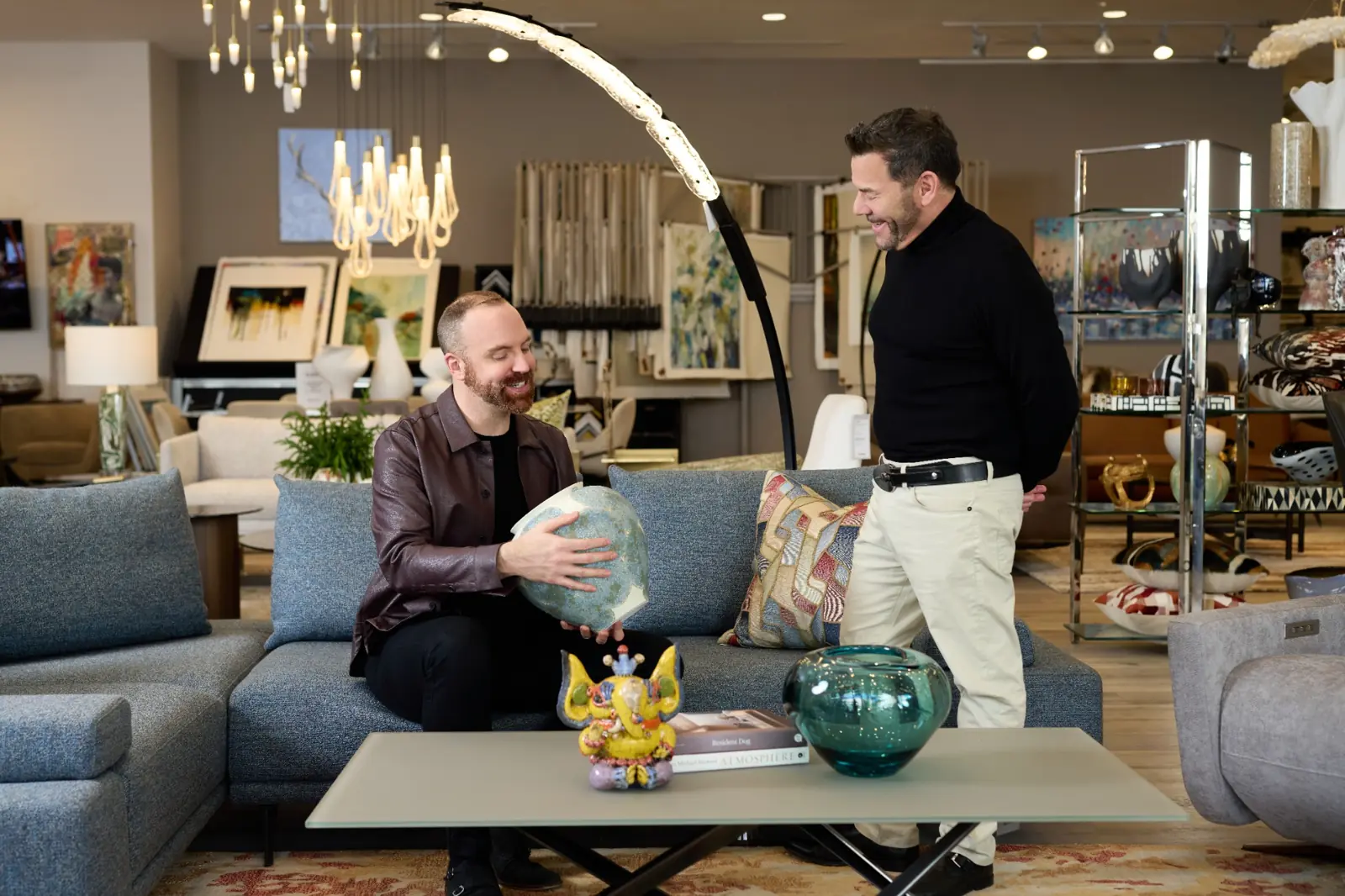 Element Home team members discussing decor during a design consultation in showroom