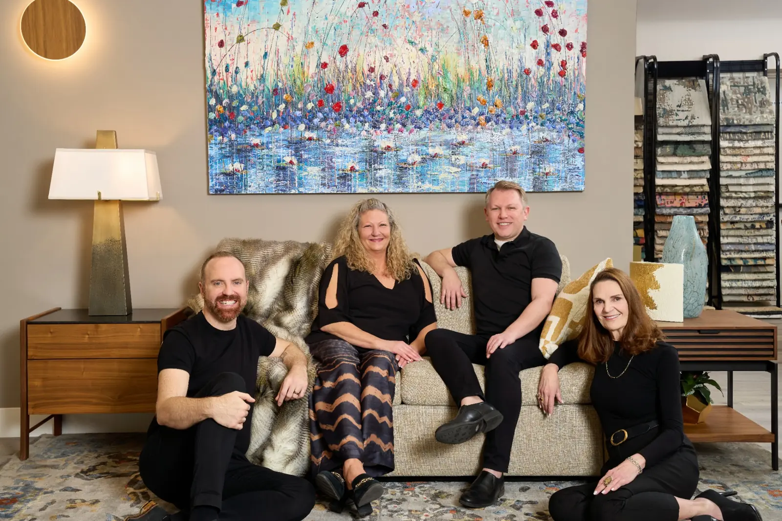 Element Home team sitting together in showroom in a relaxed group setting